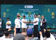 Ajak Warga Cinta Lingkungan, Kemenag Bagikan Al-Qur’an dan Bibit Pohon Gratis